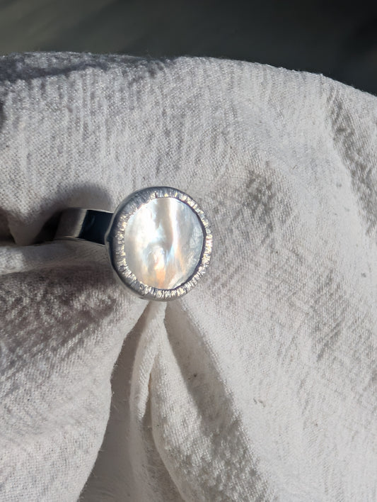Sun burst mother of pearl ring