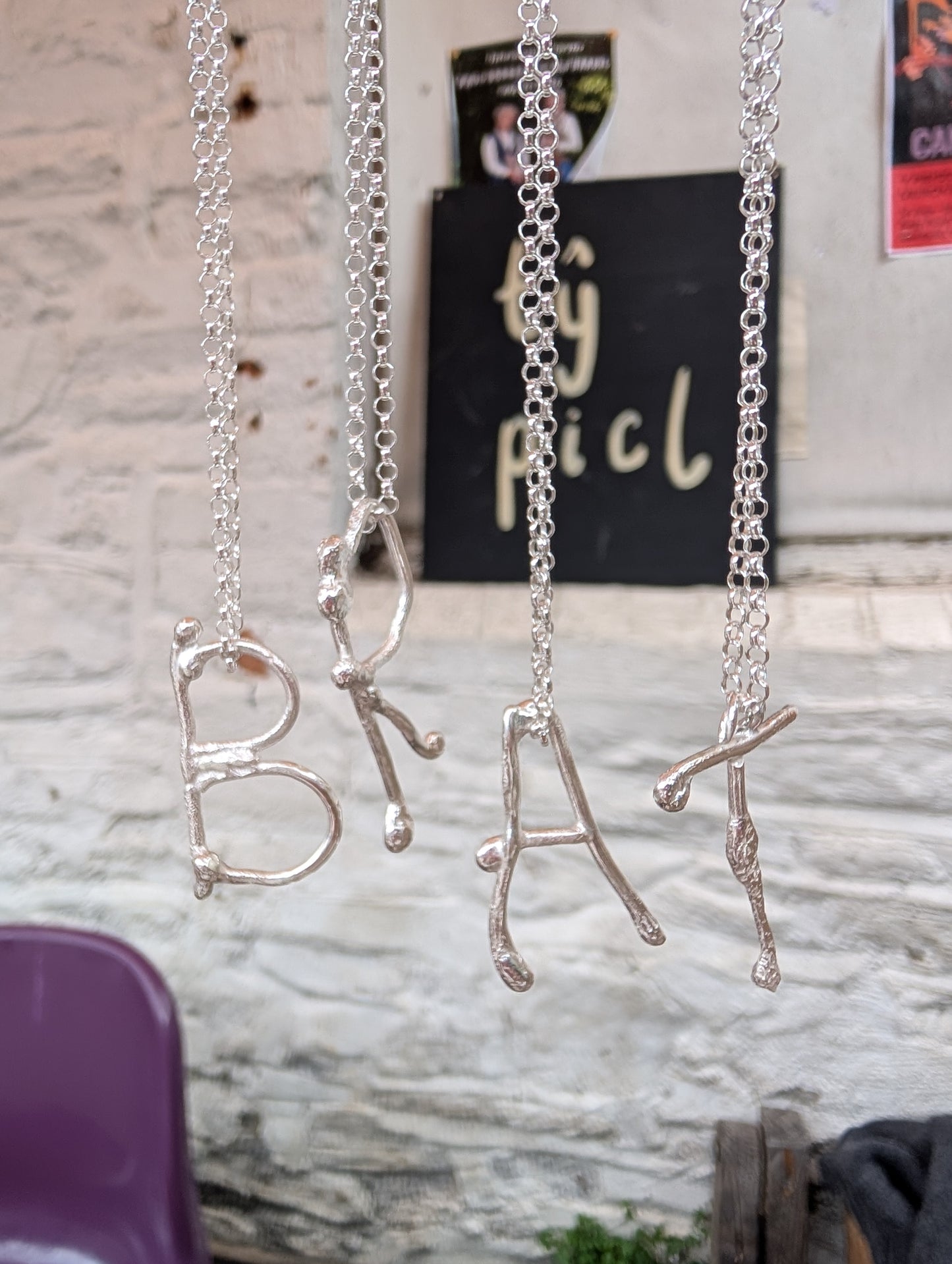 Molten initial necklace