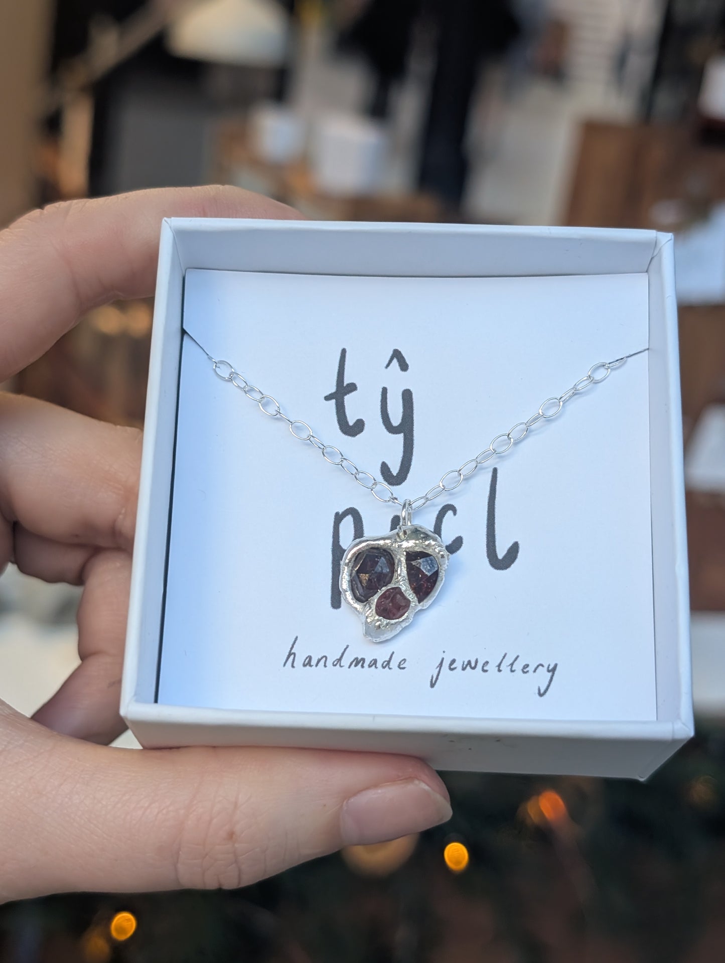 Broken hearted garnet necklace